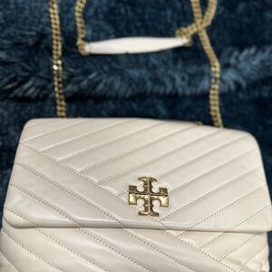 Cute soft lamb skin Tory Burch purse with chain straps. Maybe used 3-4 times